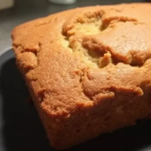 "Loaf of banana bread made with oil showcasing its moist and tender texture"