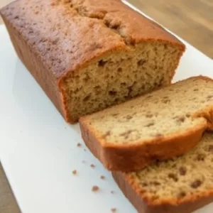 "Side-by-side comparison of banana bread made with butter and oil, showing texture differences"